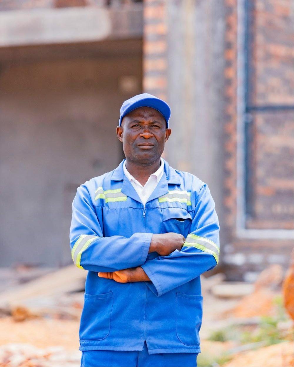 Owner of the business on site holding plans